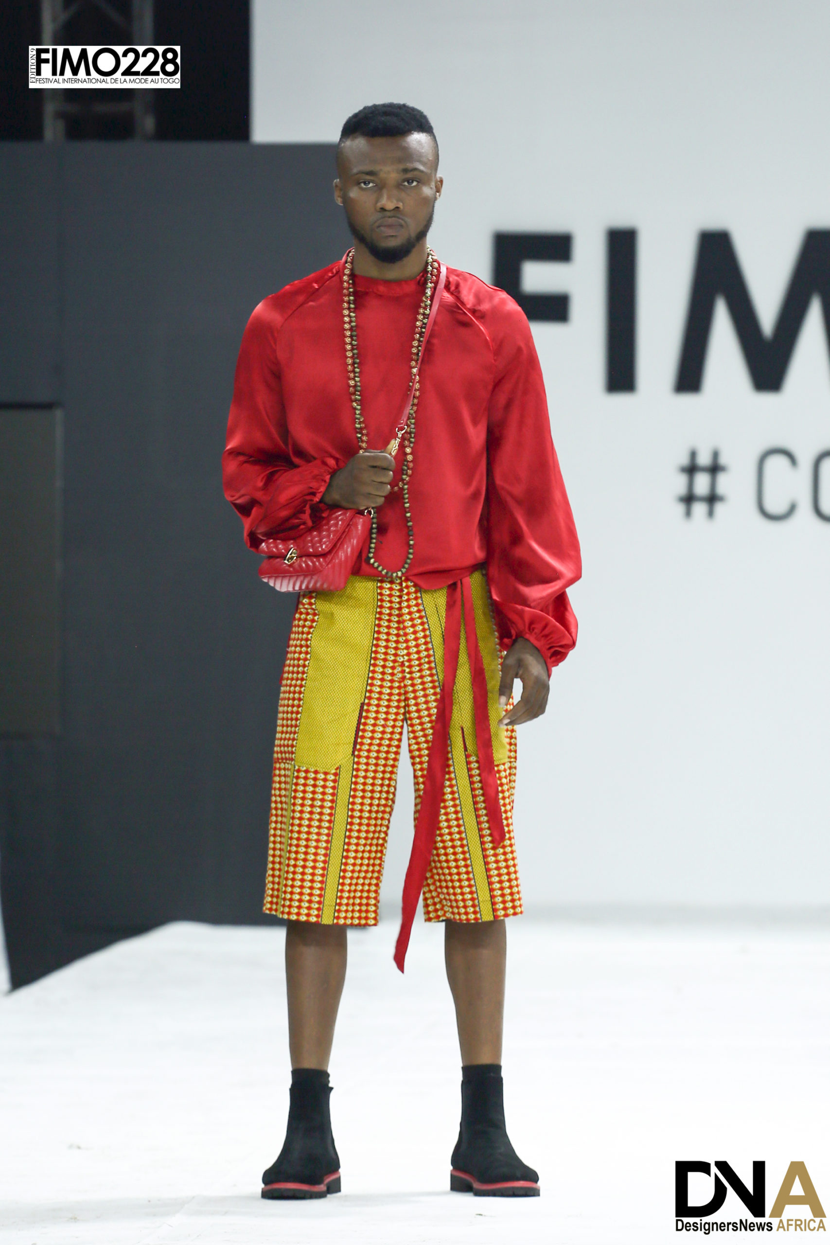 BEST AFRICAN FASHION MAGAZINE-FIMO-228-EDITION-9-2022-DEFILE-CLASSIQUE-DESIGNER-THE-MAN-MICHELLE-ANGE-NACTO-DN-AFRICA-DNA-INTERNATIONAL-MEDIA-PARTNER-MD0A0228