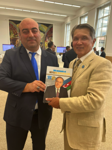 The presentation held at the UN Office at Geneva - 100 Moments of Heydar Aliyev's Life - Emil Nasirli the Author and editor of My Azerbaijan international magazine 